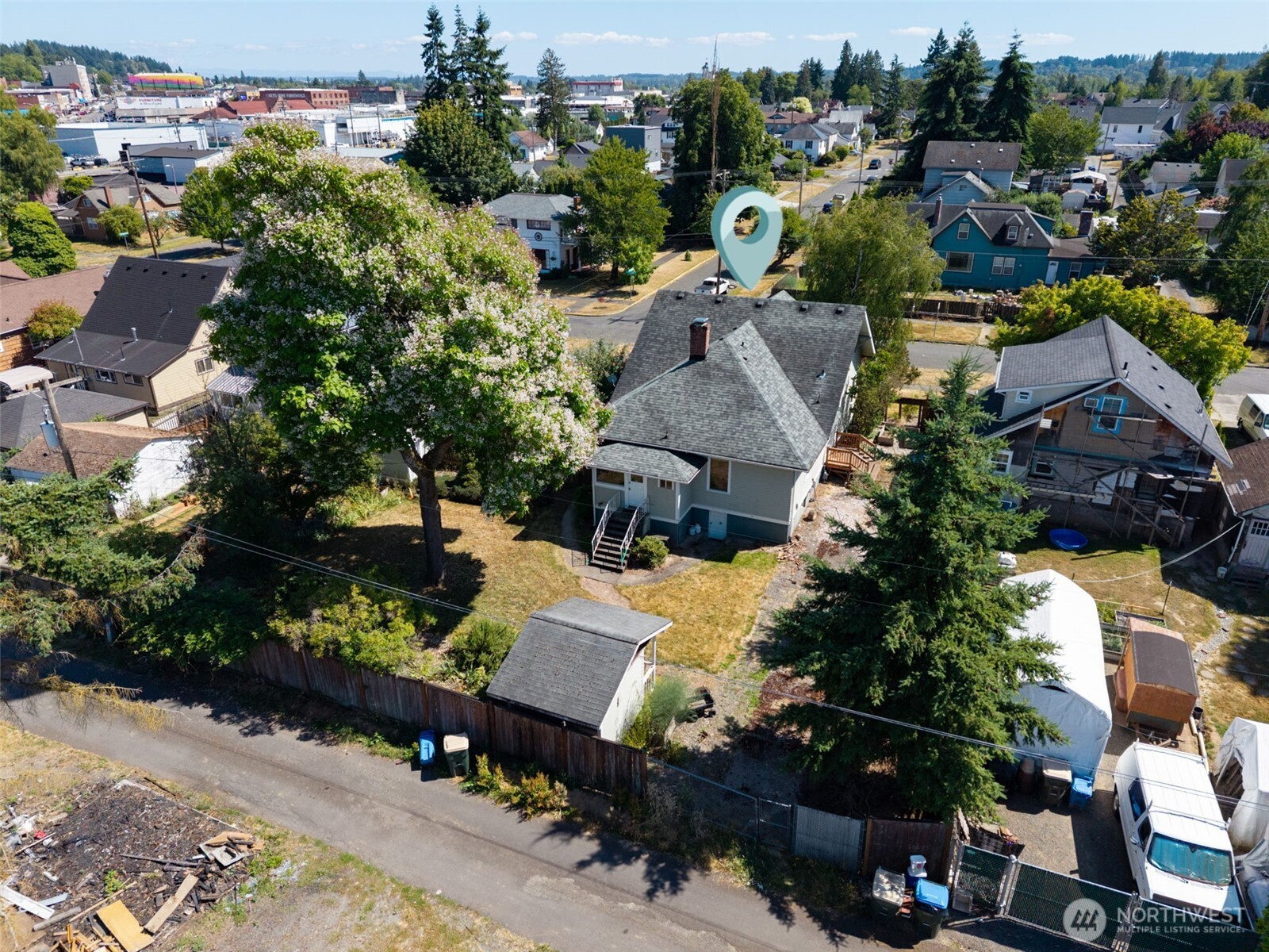 668 Northwest Folsom Street Chehalis, WA 98532 - Photo 28 of 34 an aerial view of a house with a yard basket ball court and outdoor seating