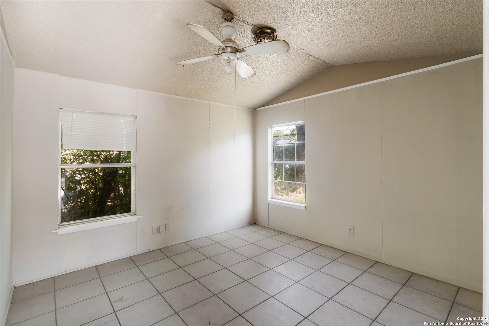3620 Rivas Street San Antonio, TX 78228 - Photo 6 of 15 a view of an empty room with a window