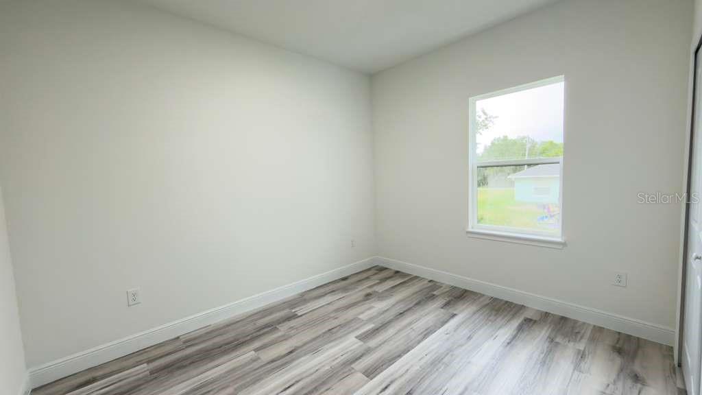 14905 Southwest 24th Circle Ocala, FL 34472 - Photo 10 of 24 an empty room with a window
