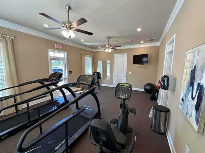 704 Calypso Way Cumming, GA 30040 - Photo 33 of 33 a view of a room with gym equipment