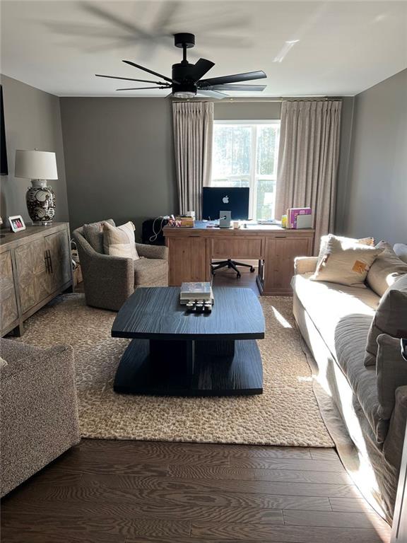 704 Calypso Way Cumming, GA 30040 - Photo 4 of 33 a living room with furniture and a large window
