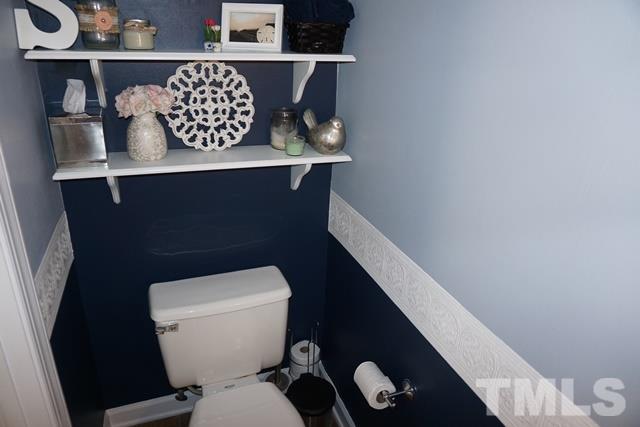 215 Danforth Drive Cary, NC 27511 - Photo 21 of 25 a bathroom with a toilet