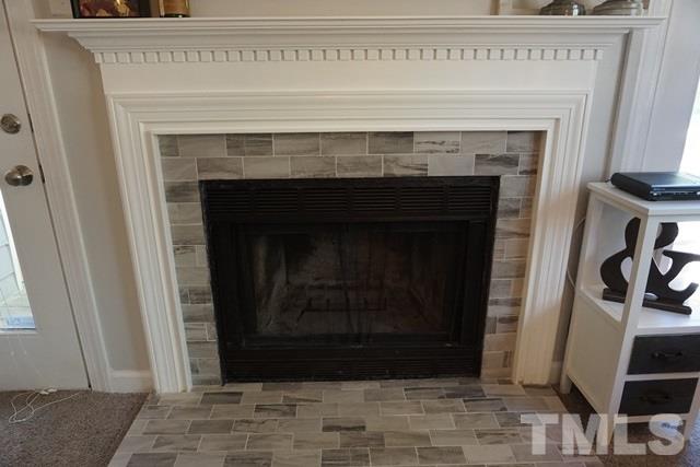 215 Danforth Drive Cary, NC 27511 - Photo 10 of 25 a close view of a fireplace