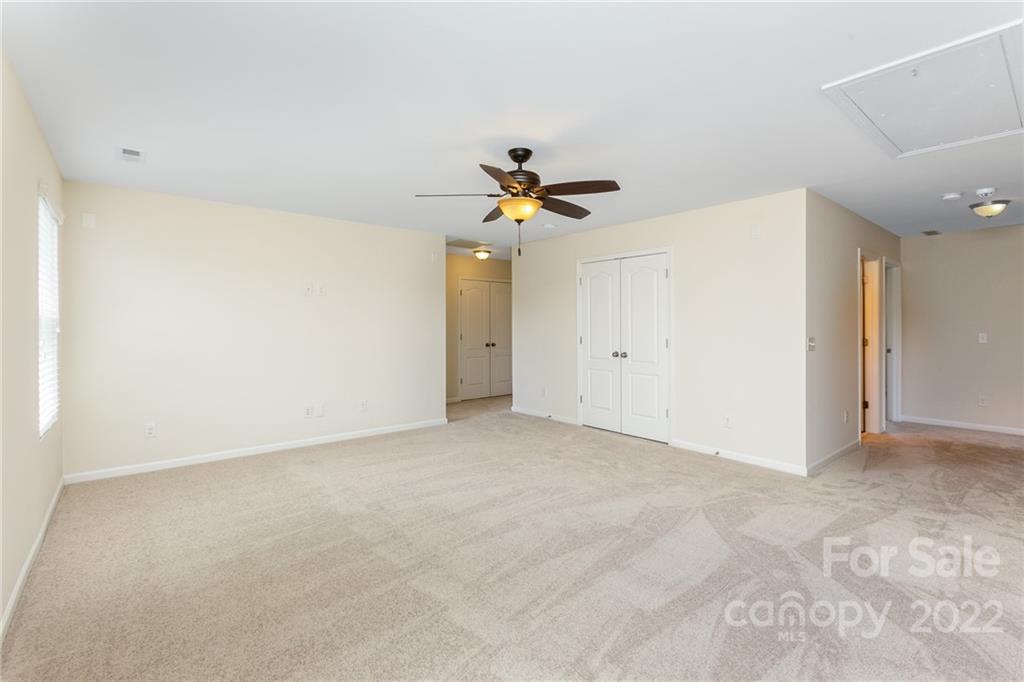 1438 Afternoon Sun Road Matthews, NC 28104 - Photo 17 of 36 a view of an empty room
