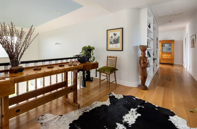 a bedroom with a bed and a fireplace