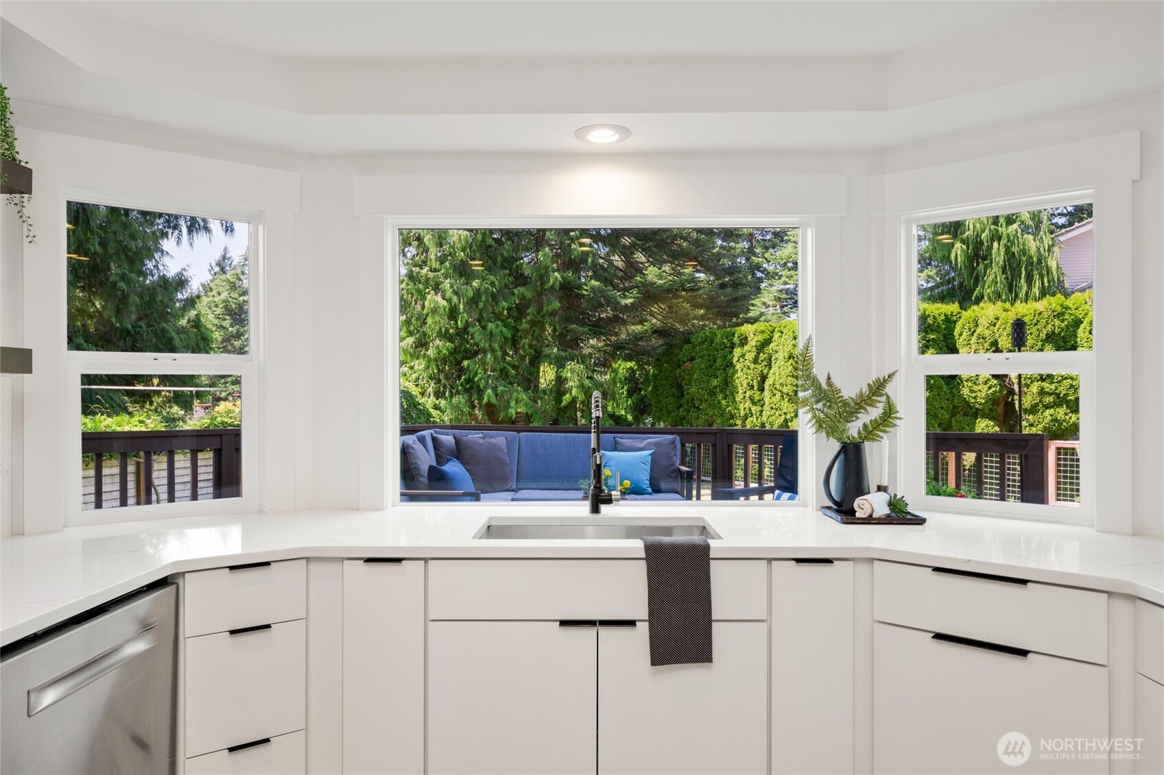 706 Fieldston Road Bellingham, WA 98225 - Photo 13 of 40 a kitchen with a sink and a large window