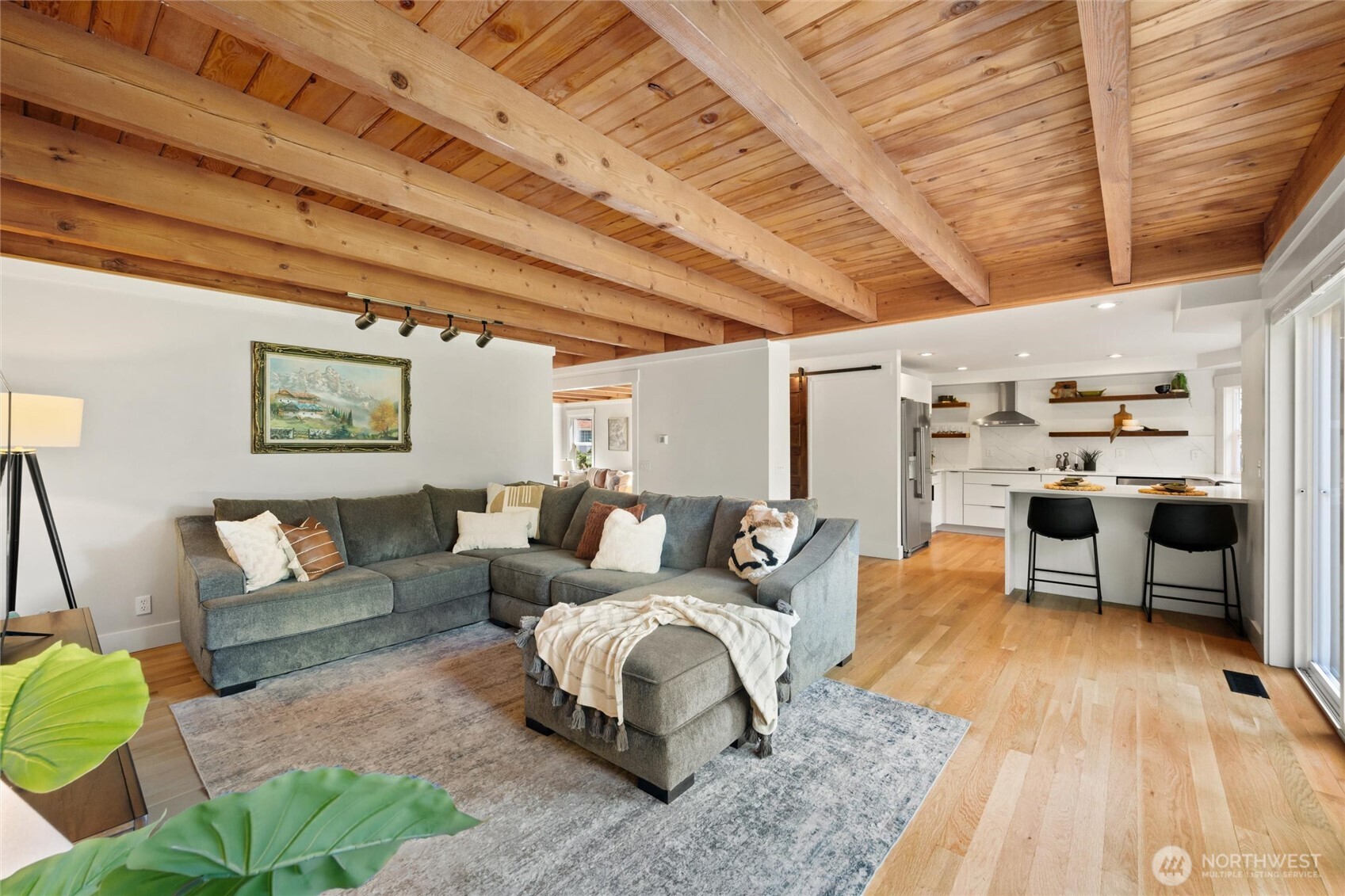 706 Fieldston Road Bellingham, WA 98225 - Photo 15 of 40 a living room with furniture and a wooden floor