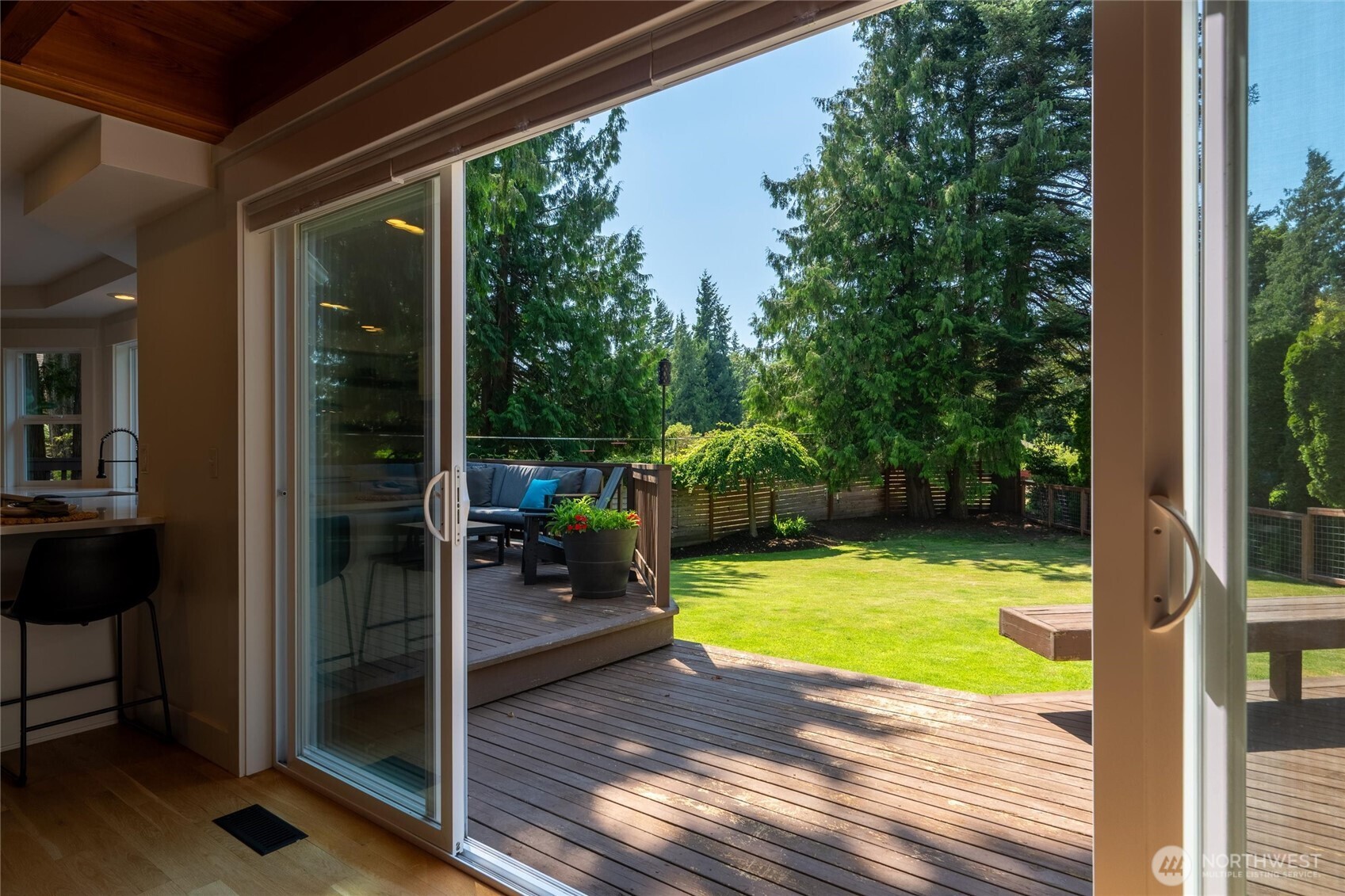 706 Fieldston Road Bellingham, WA 98225 - Photo 16 of 40 a view of a swimming pool with a porch and furniture