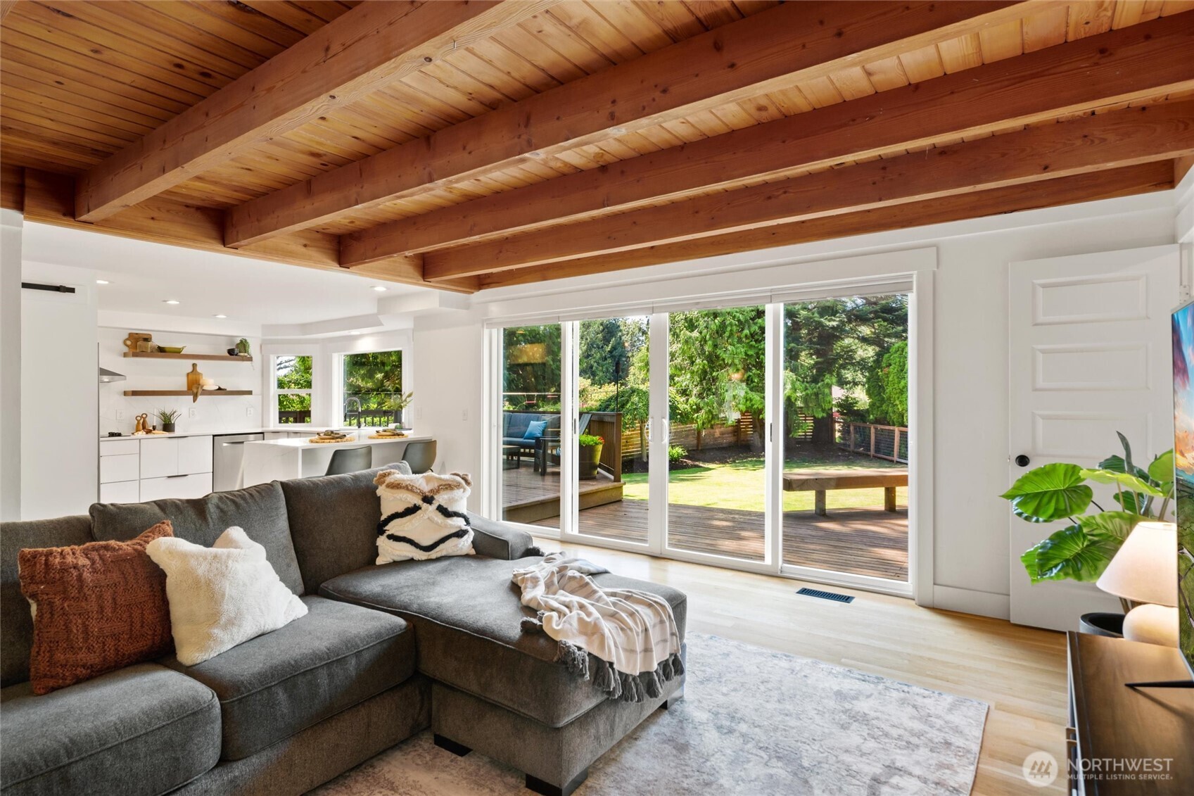 706 Fieldston Road Bellingham, WA 98225 - Photo 19 of 40 a living room with furniture and a potted plant