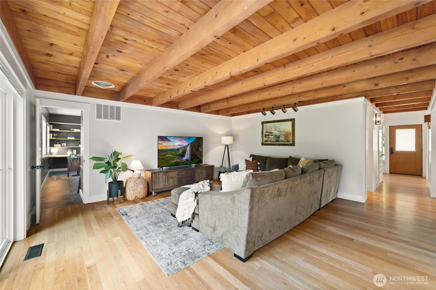 706 Fieldston Road Bellingham, WA 98225 - Photo 20 of 40 a living room with furniture and a flat screen tv