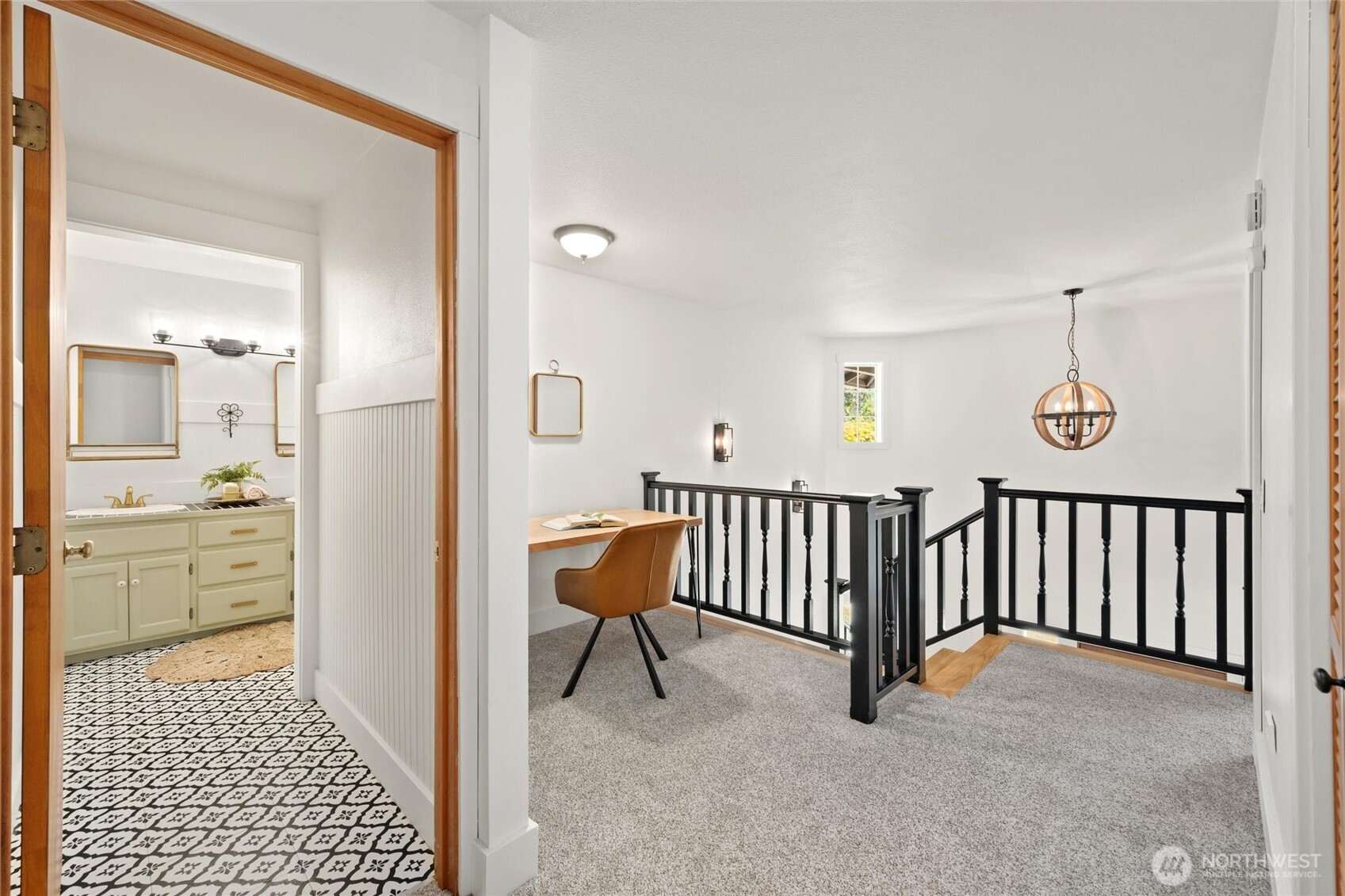 706 Fieldston Road Bellingham, WA 98225 - Photo 29 of 40 a view of a hallway with bathroom and wooden floor