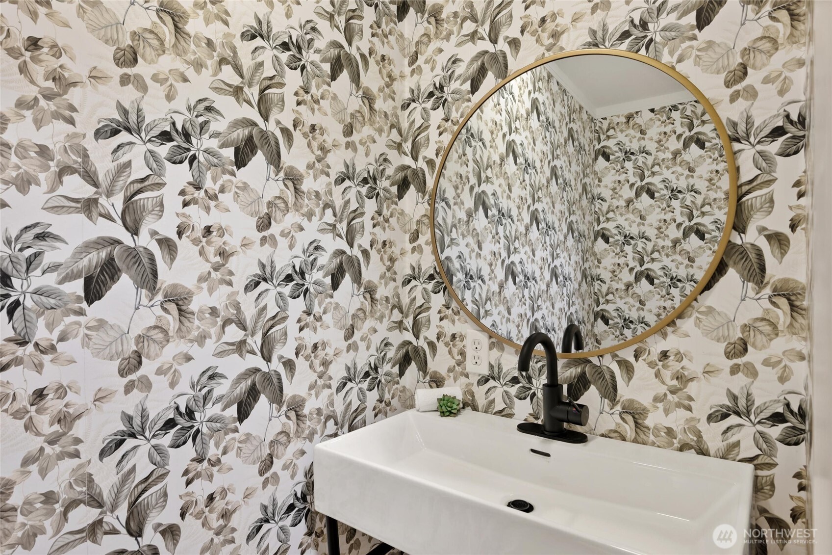 706 Fieldston Road Bellingham, WA 98225 - Photo 33 of 40 a bathroom with a sink and a mirror