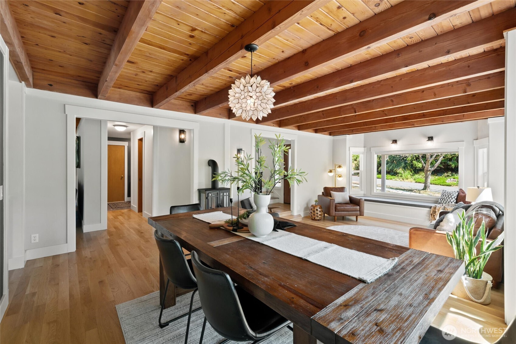 706 Fieldston Road Bellingham, WA 98225 - Photo 7 of 40 a view of a dining room with furniture window and wooden floor