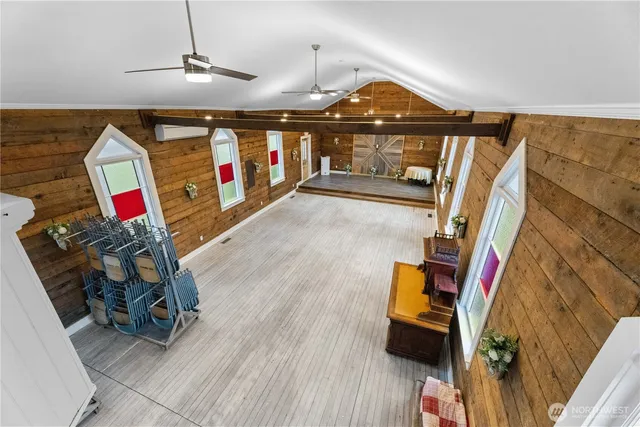 a view of a lake with a tree