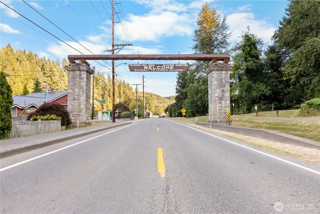 a house with trees in the background