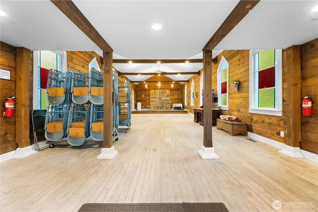 a lobby with indoor furniture and shower