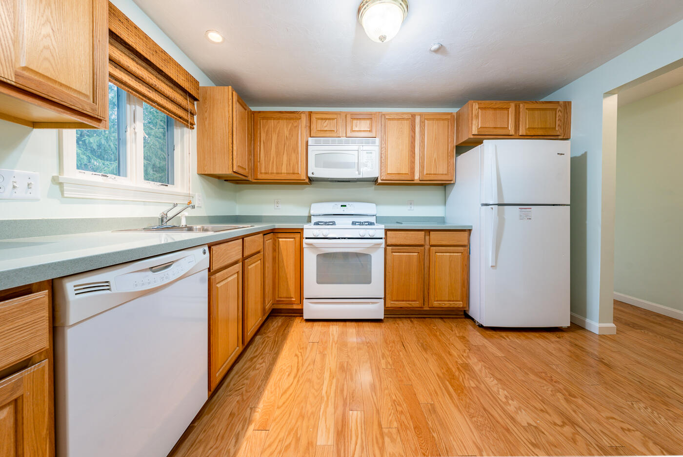 20 North Ridge Road Mashpee, MA 02649 - Photo 3 of 14 a kitchen with stainless steel appliances granite countertop a stove a refrigerator and a sink