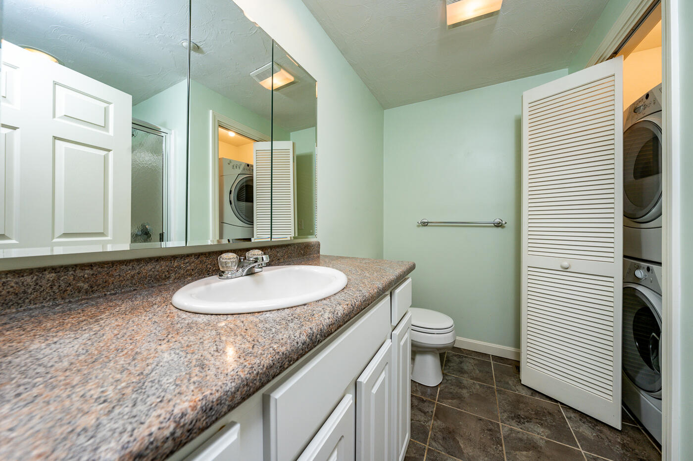 20 North Ridge Road Mashpee, MA 02649 - Photo 9 of 14 a bathroom with a granite countertop sink and a mirror