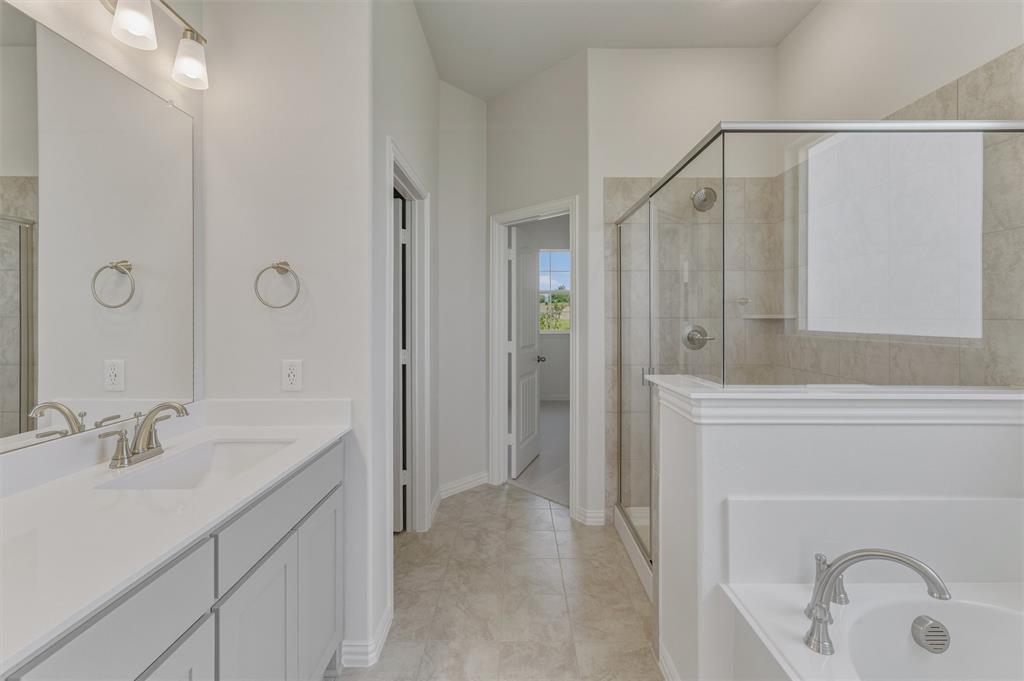 114 Hillview Trail Decatur, TX 76234 - Photo 17 of 27 Dual vanity with white cabinetry, integrated sinks, and brushed nickel fixtures