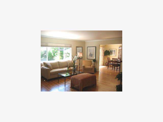 1674 Kitchener Drive Sunnyvale, CA 94087 - Photo 2 of 6 a living room with furniture and a large window