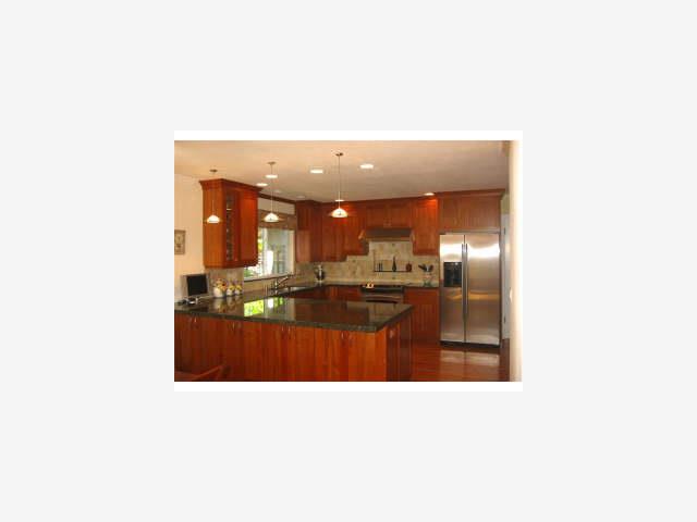 1674 Kitchener Drive Sunnyvale, CA 94087 - Photo 4 of 6 a bathroom with a sink a mirror and bathtub