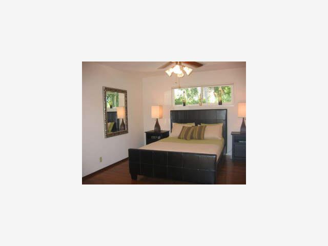 1674 Kitchener Drive Sunnyvale, CA 94087 - Photo 5 of 6 a living room with a couch and window