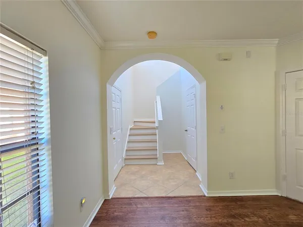 a view of entryway with wooden floor