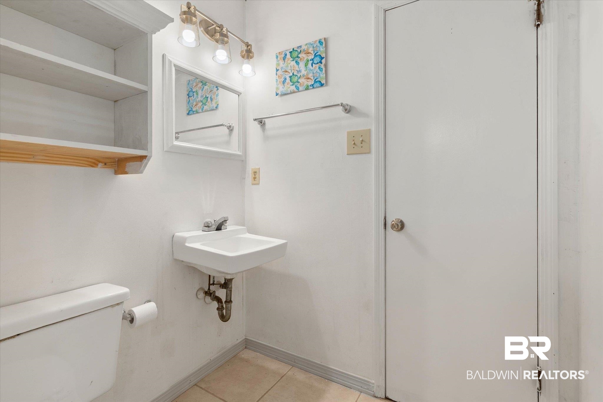 5503 Darring Street Satsuma, AL 36572 - Photo 22 of 31 Bathroom featuring toilet and tile patterned flooring