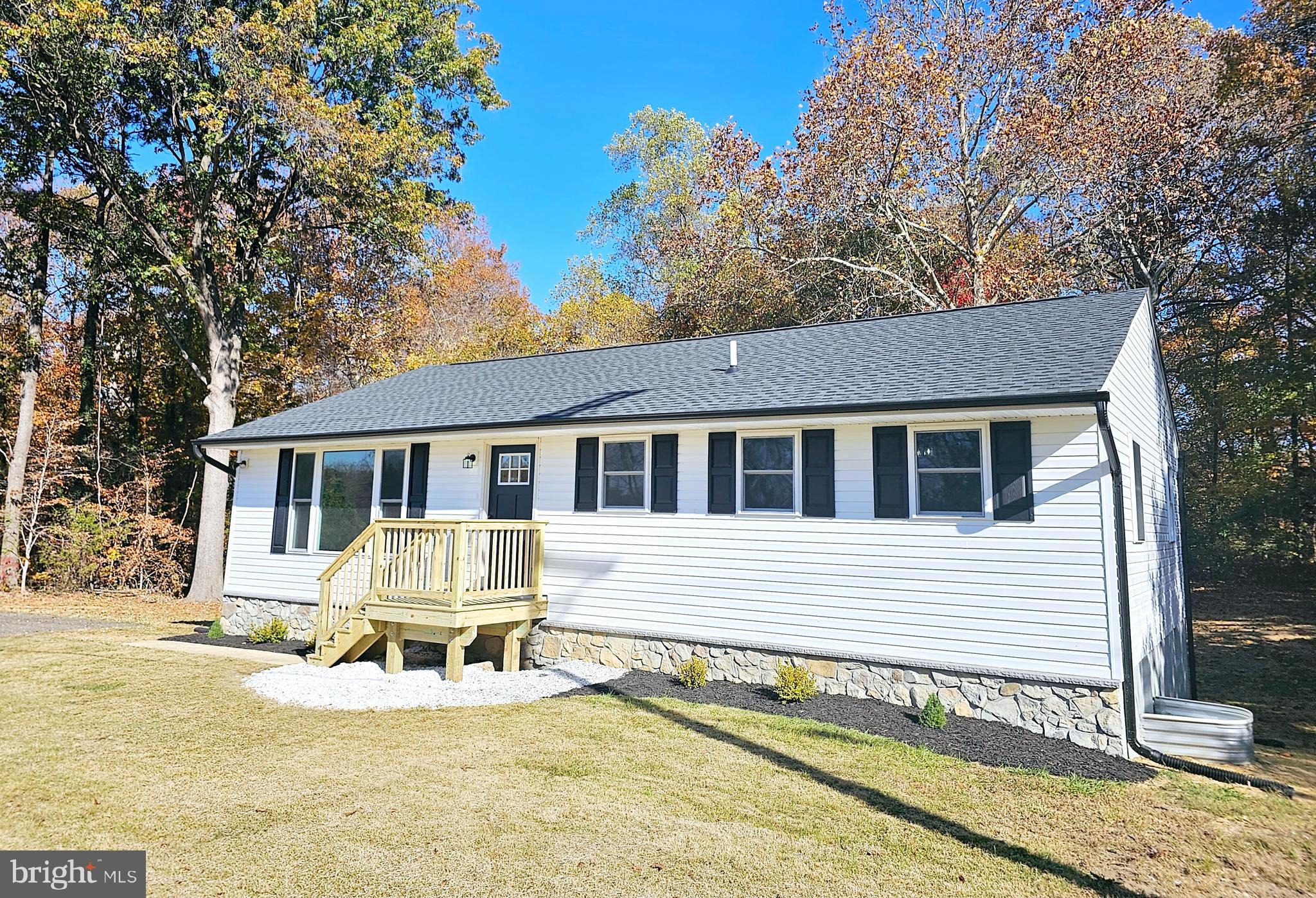 a front view of a house with a patio
