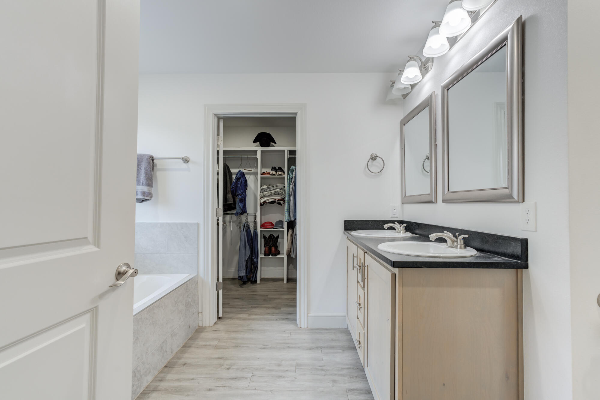 7020 24th Street Lubbock, TX 79407 - Photo 20 of 31 a kitchen that has a sink and a stove