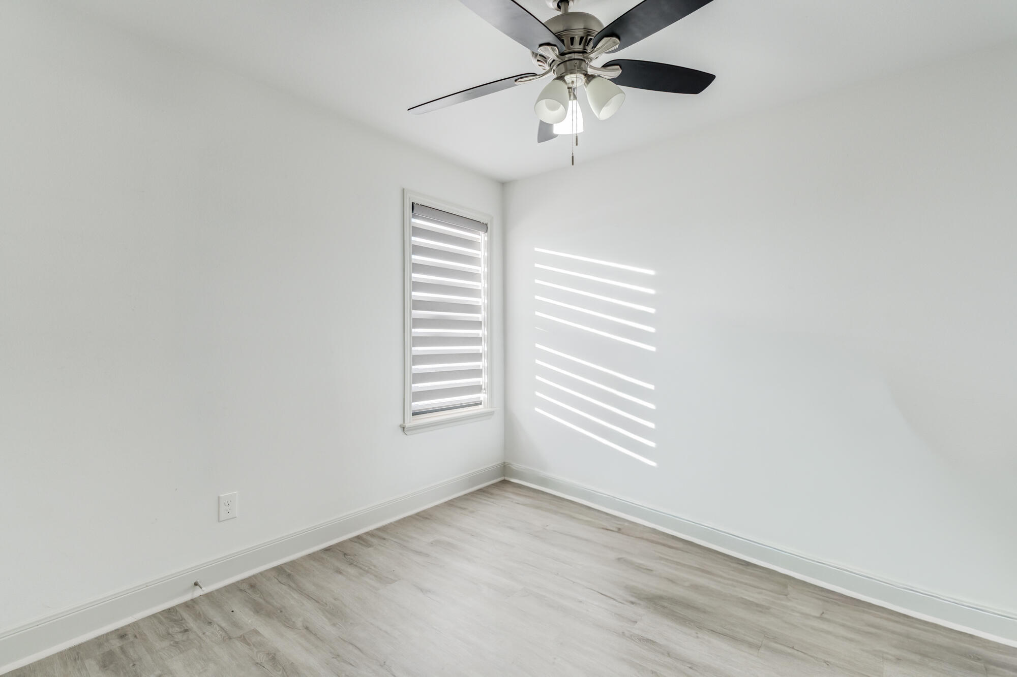 7020 24th Street Lubbock, TX 79407 - Photo 27 of 31 a view of an empty room with a window