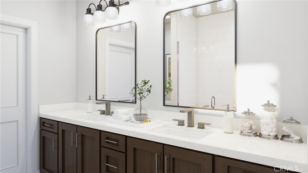 76 Bigsby Drive Stanton, CA 90680 - Photo 11 of 13 a bathroom with double vanity sinks and a mirror