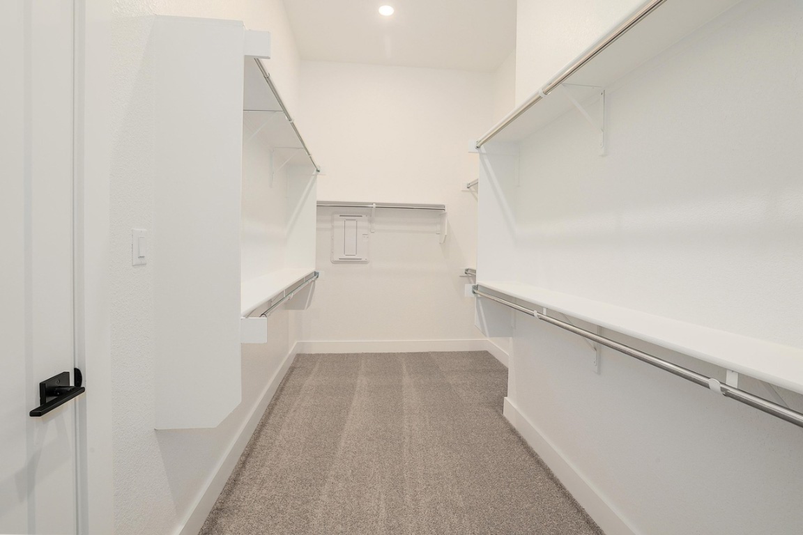 1604 Lilly Grace Bend Leander, TX 78641 - Photo 13 of 22 a view of an empty walk in closet