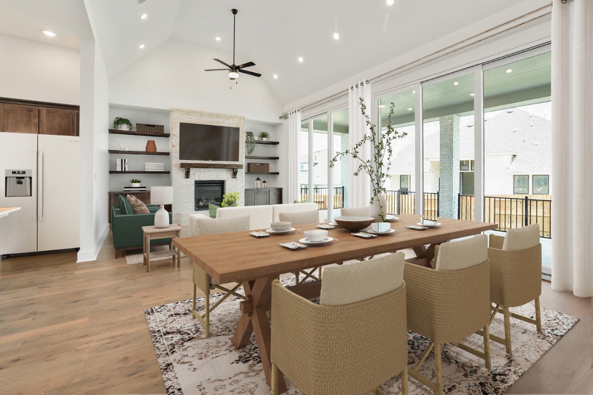 1604 Lilly Grace Bend Leander, TX 78641 - Photo 5 of 22 a view of a dining room with furniture window and wooden floor