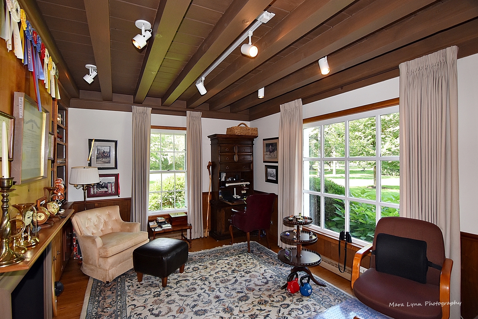 6-n063 Surrey Road Wayne, IL 60184 - Photo 22 of 40 a living room with furniture and a floor to ceiling window