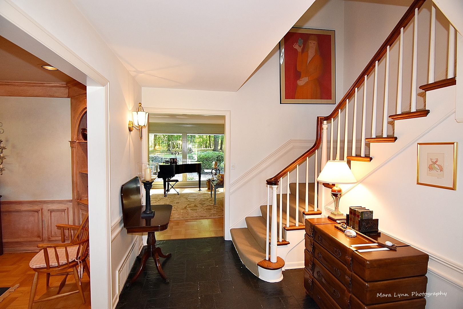6-n063 Surrey Road Wayne, IL 60184 - Photo 8 of 40 a view of hall way with furniture and staircase