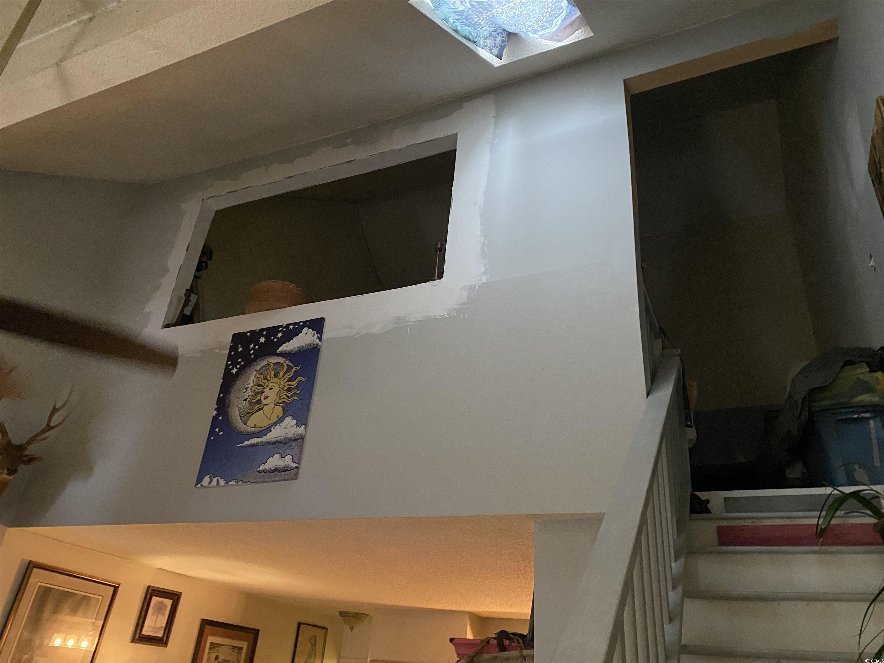 405 Cambridge Circle, Unit B5 Murrells Inlet, SC 29576 - Photo 12 of 14 Room details featuring a skylight