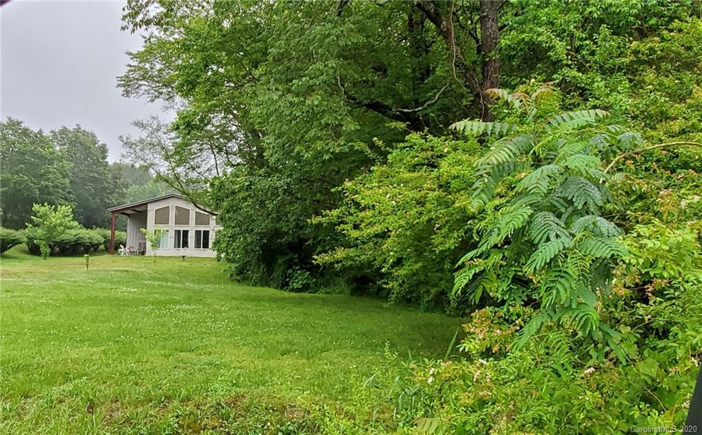 21 Lake Adger Road Mill Spring, NC 28756 - Photo 7 of 17 a view of a garden