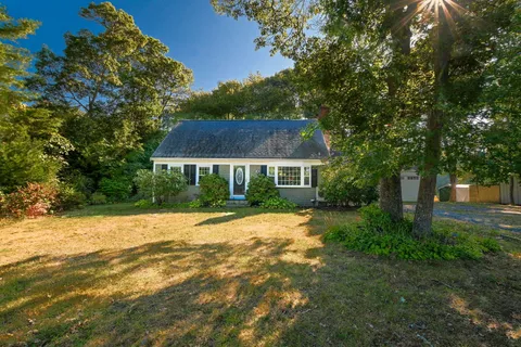 a house with yard in front of it