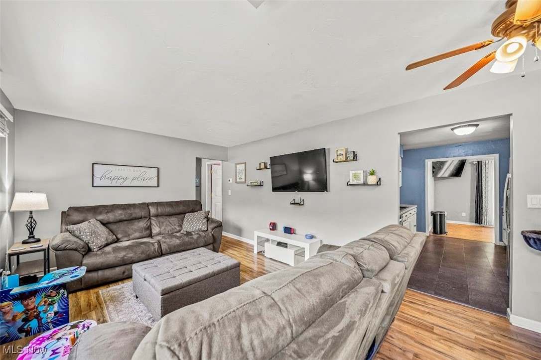 1864 Green Road Madison, OH 44057 - Photo 4 of 29 Living room featuring light hardwood / wood-style flooring and ceiling fan