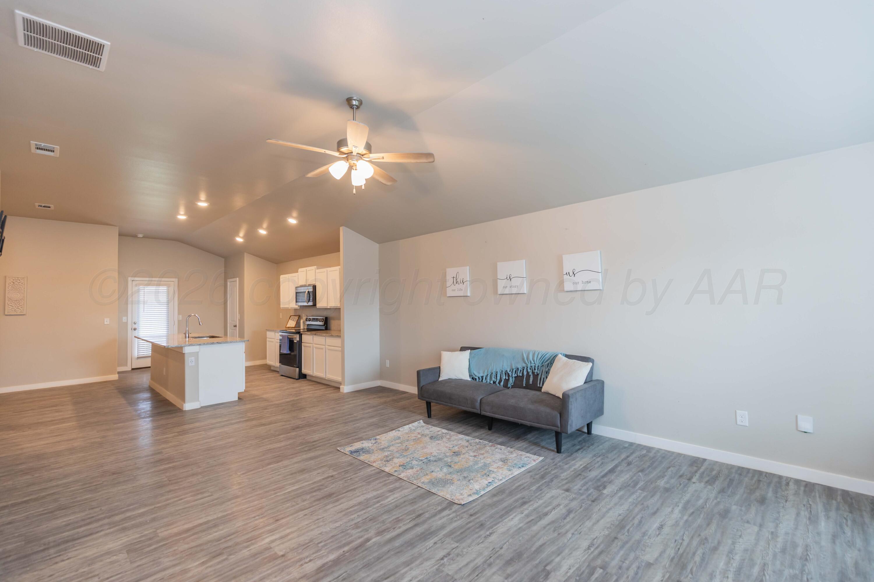 7000 Athens Street Amarillo, TX 79118 - Photo 9 of 42 LIVING ROOM VIEW 4