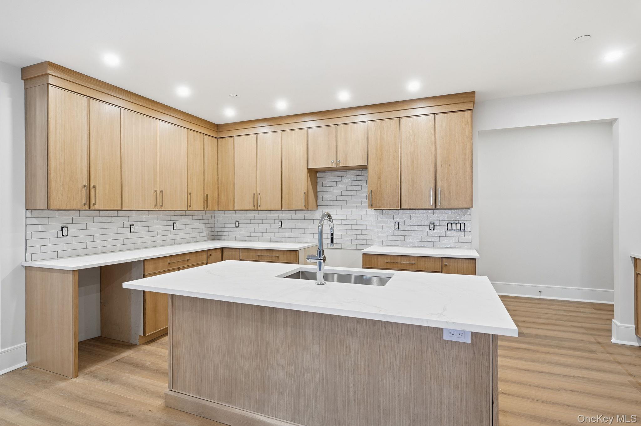 34 Clinton Avenue, Unit 4 Dobbs Ferry, NY 10522 - Photo 3 of 15 a kitchen with a sink and a cabinets