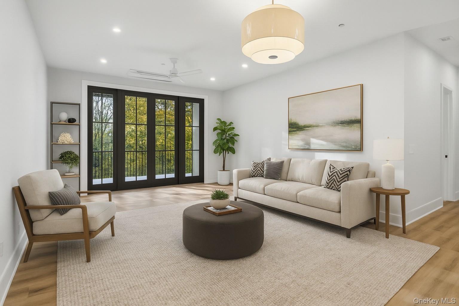 34 Clinton Avenue, Unit 4 Dobbs Ferry, NY 10522 - Photo 5 of 15 a living room with furniture and a large window