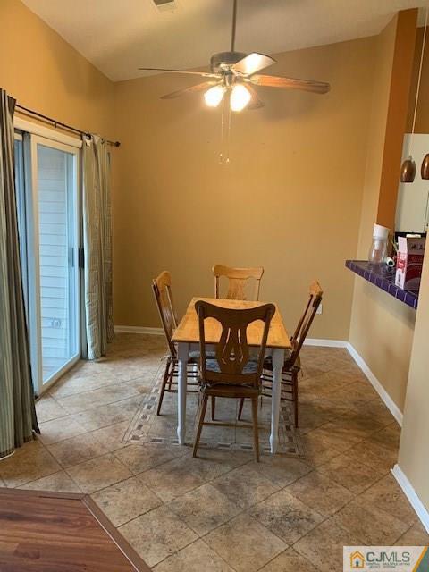1230 Edpas Road, Unit 1230 New Brunswick, NJ 08901 - Photo 3 of 12 a view of a livingroom with furniture and a chandelier