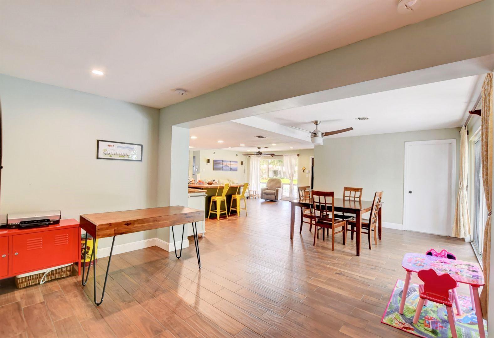 501 Southwest 8th Terrace Boca Raton, FL 33486 - Photo 13 of 28 Long open view through dining