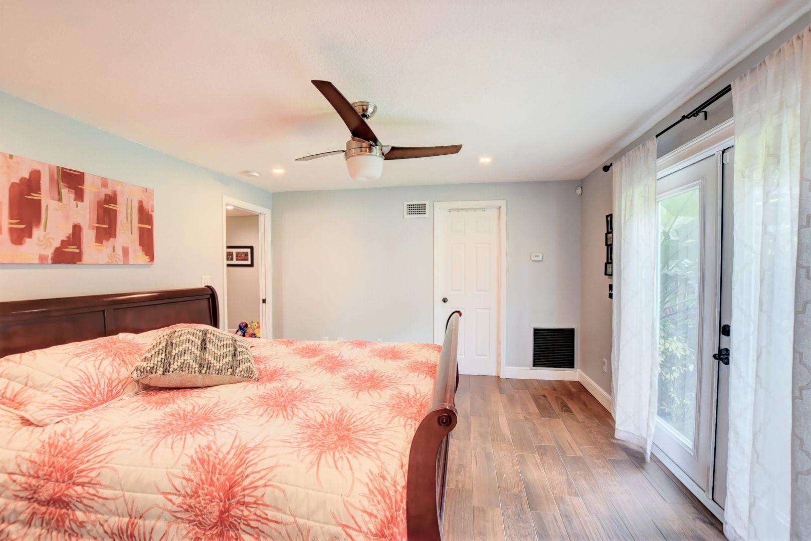 501 Southwest 8th Terrace Boca Raton, FL 33486 - Photo 14 of 28 Master Bedroom French doors