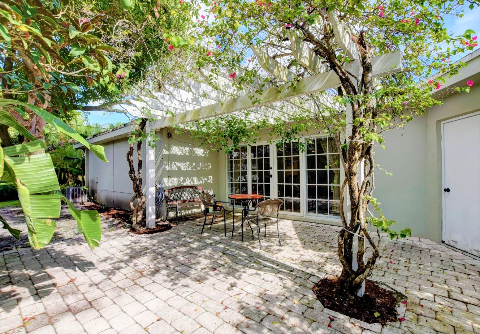 501 Southwest 8th Terrace Boca Raton, FL 33486 - Photo 21 of 28 Trellis Paved patio by dining