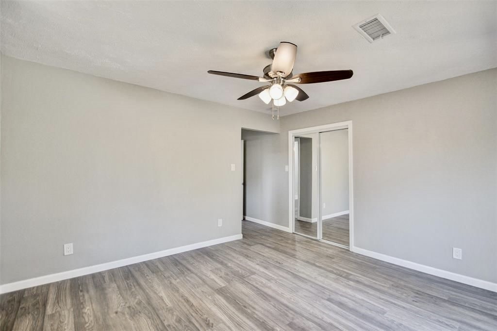 7906 Hammerly Boulevard Houston, TX 77055 - Photo 12 of 22 a view of an empty room with a window