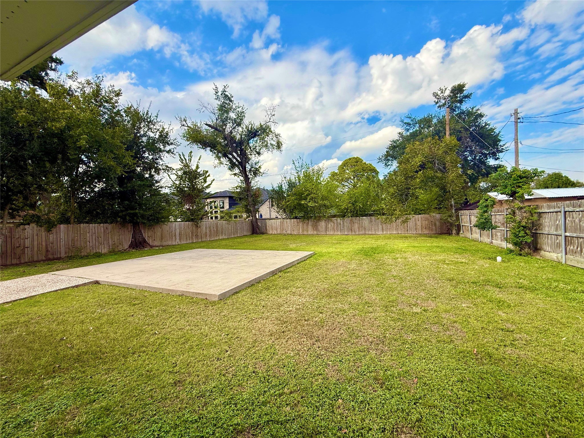 7906 Hammerly Boulevard Houston, TX 77055 - Photo 22 of 22 a view of yard with swimming pool and green space
