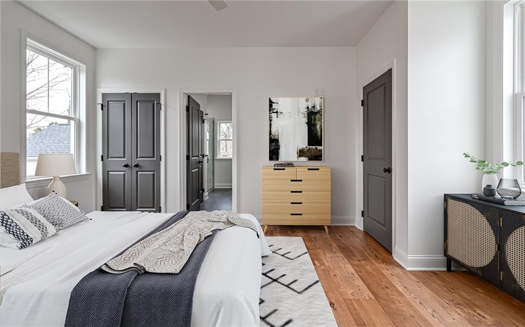 1773 Locust Road Sewickley, PA 15143 - Photo 17 of 34 Primary bedroom with staged furniture.